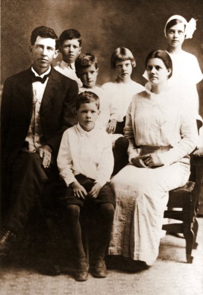 The Clinton McKamey Barrick family, c. 1916:  Clinton, Clayton, Hilburn (seated), L. D., Myra, Ruey Sophorah (Sherrill), Ruby